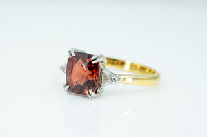 18ct Yellow Gold and White Gold ring with Solitaire Garnet