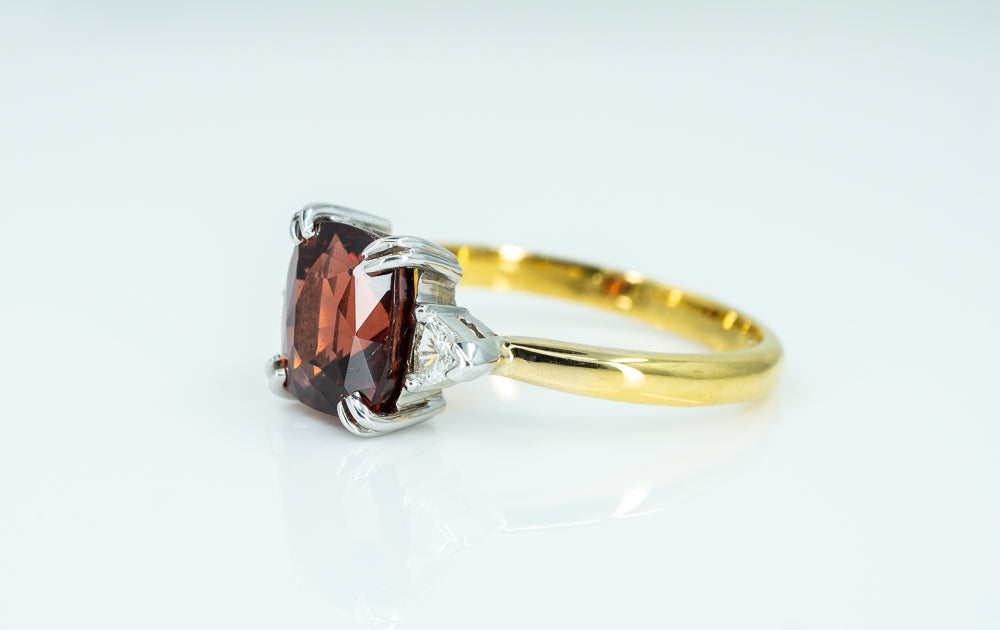 18ct Yellow Gold and White Gold ring with Solitaire Garnet